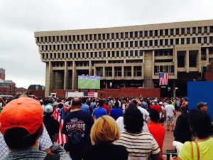 Boston city hall square full with people
